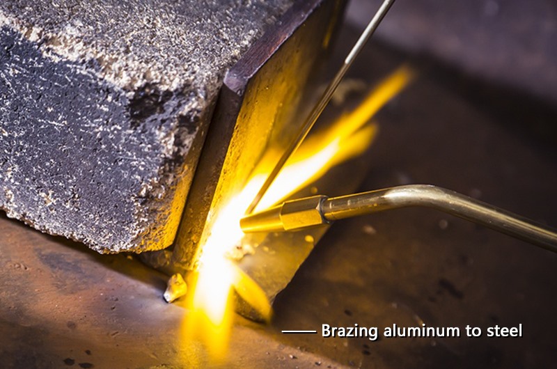 Brazing aluminum to steel